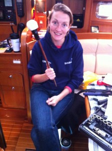 Susie and our home-made dipstick with nappy end to clean fuel tanks!