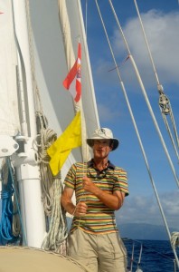 James hoists the French Polynesia courtesy flag and Q flag